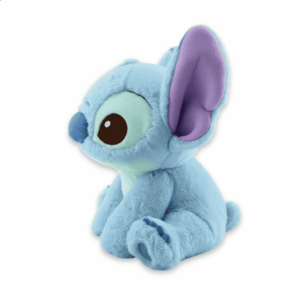 Blauwe Disney Stitch pluche knuffel van 25cm, staand in driekwart aanzicht.