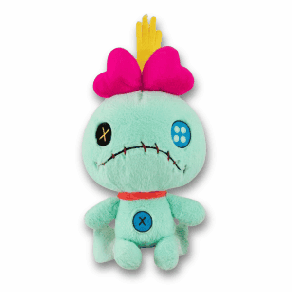 Groene pluche Scrump knuffel, Lilo's handgemaakte pop uit Disney's Lilo & Stitch, met patches en een knoop.